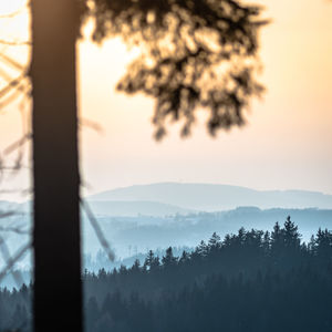 Scenic view of mountains against sky during sunset