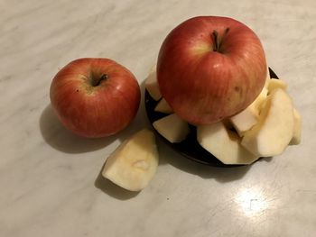 High angle view of apples in bowl on table