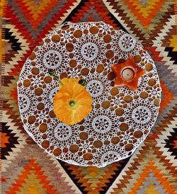 High angle view of yellow flowers on table