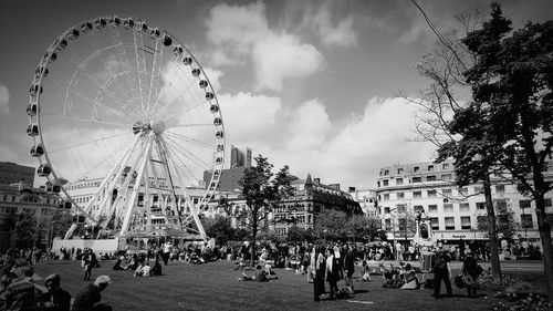 Low angle view of ferris wheel against sky