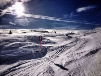 Scenic view of snowcapped mountain against sky