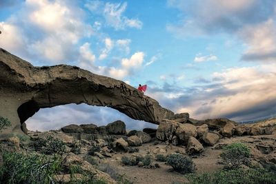 Rock formations on mountain against sky