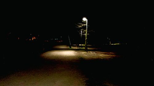 Illuminated street light at night