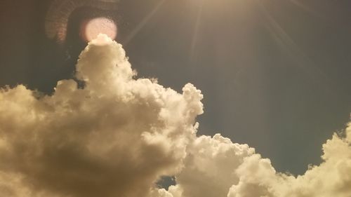 Low angle view of clouds in sky during sunny day