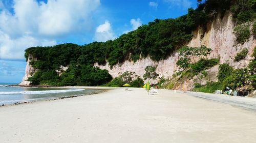 Scenic view of sea against cloudy sky