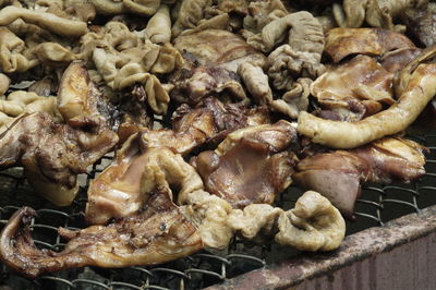 Close-up of meat on barbecue grill