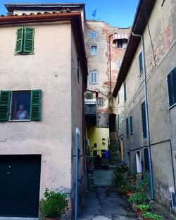 Narrow alley along buildings