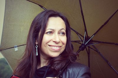 Close-up portrait of a smiling young woman