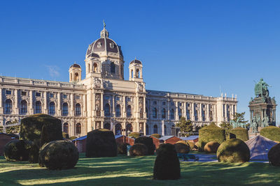 Low angle view of kunsthistorisches museum against clear blue sky