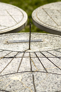 High angle view of metal railing on footpath