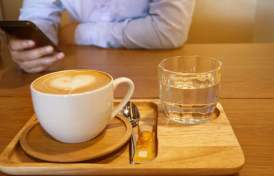 Coffee cup on table