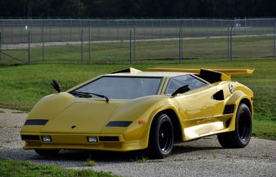 Yellow car on road