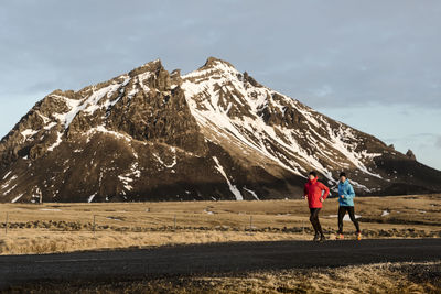 Men jogging in mountains  on the move