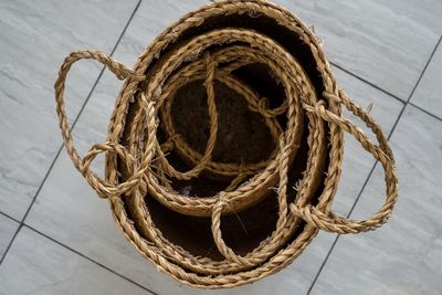 High angle view of ropes tied up on table