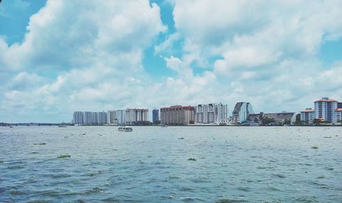 Scenic view of sea against cloudy sky