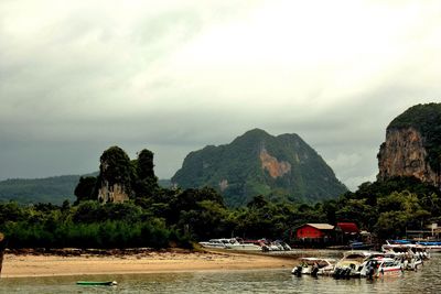 Scenic view of mountain against cloudy sky
