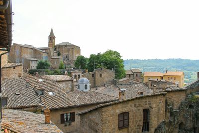 Houses against clear sky