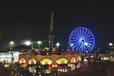 View of illuminated city at night