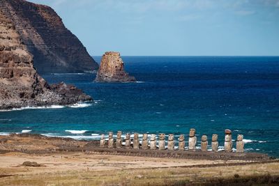 Moai statues by sea at easter island