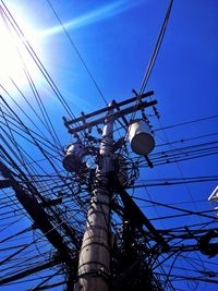 Low angle view of electricity pylon