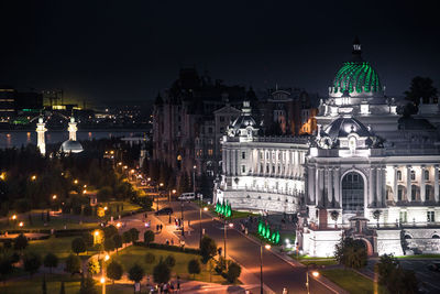 Illuminated buildings in city at night