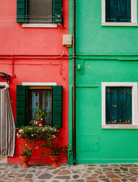 Characteristic red and green colored houses in burano