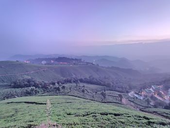 Scenic sunset view of the munnar tea plantations  against the sky