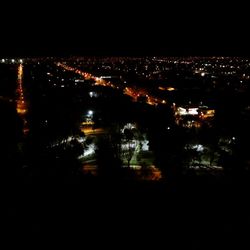 Illuminated cityscape at night