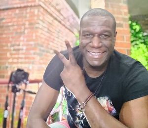 Portrait of smiling young man outdoors