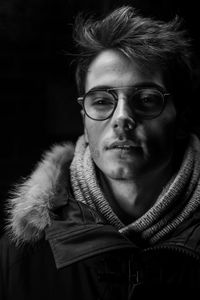 Portrait of young man wearing eyeglasses