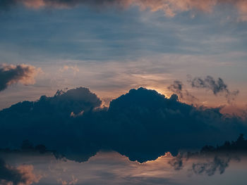 Low angle view of silhouette trees against sky during sunset