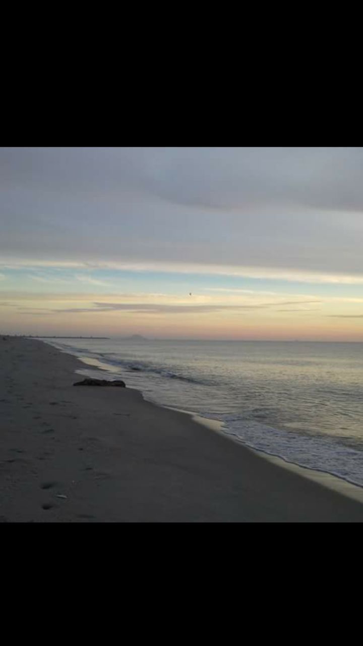 sea, beach, water, scenics, tranquil scene, tranquility, sunset, horizon over water, beauty in nature, nature, sand, sky, no people, outdoors, cloud - sky, wave, day