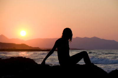 Scenic view of sea at sunset