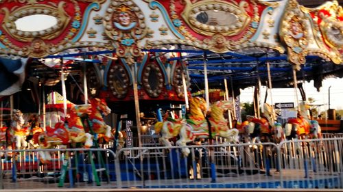 View of carousel in amusement park