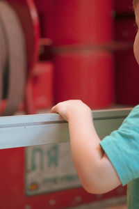 Close-up of boy playing with ball