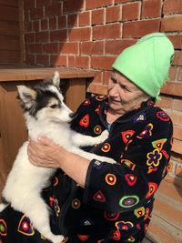 Close-up of woman and dog