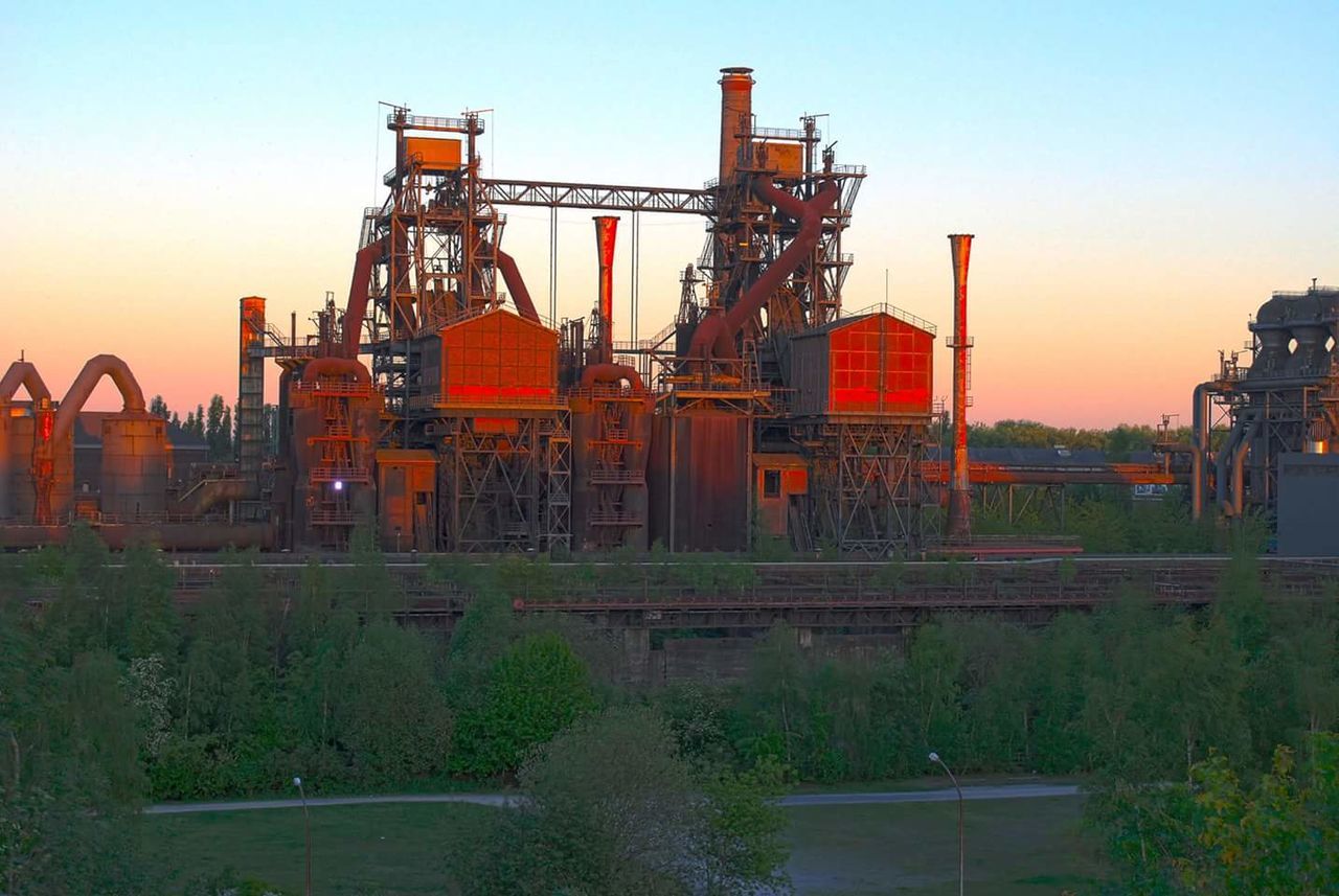 FACTORY AGAINST SKY DURING SUNSET