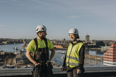 People talking at construction site