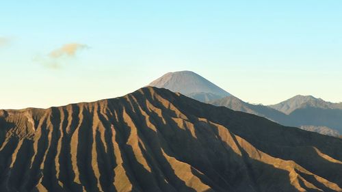 Scenic view of mountain range against sky