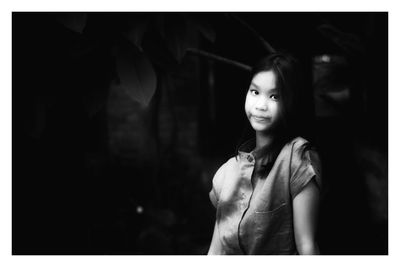 Portrait of girl in darkroom