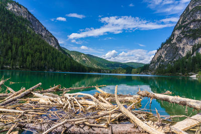 Scenic view of lake and mountains against sky