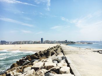 Scenic view of beach against sky