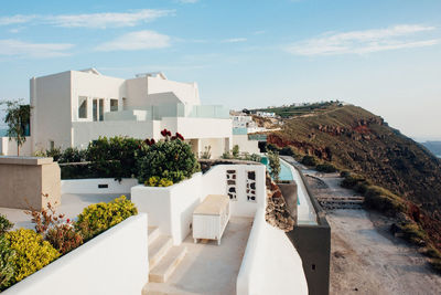 Houses and buildings against sky