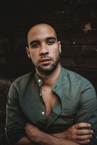 Portrait of man sitting outdoors