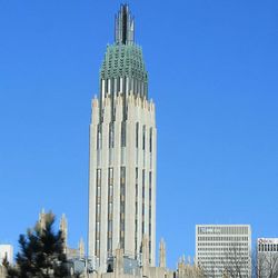 Low angle view of modern building against clear blue sky