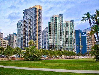 View of skyscrapers against blue sky