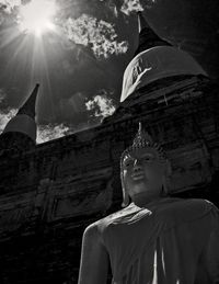 Low angle view of statue against building