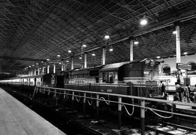 Train at railroad station at night