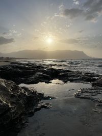 Scenic view of sea against sky during sunset