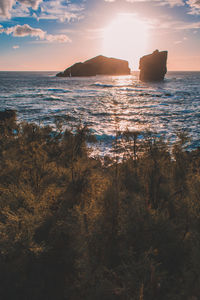 Scenic view of sea against sky during sunset